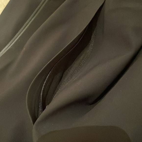 Lululemon black raincoat size 2. Beautiful jacket in perfect condition. - Picture 7 of 9